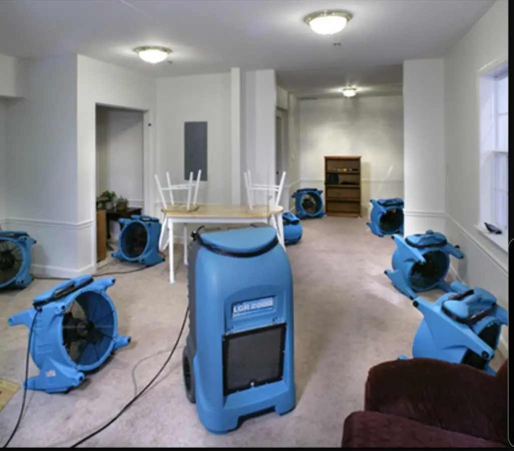 Air movers and dehumidifier setup for Water Damage Restoration in Blair